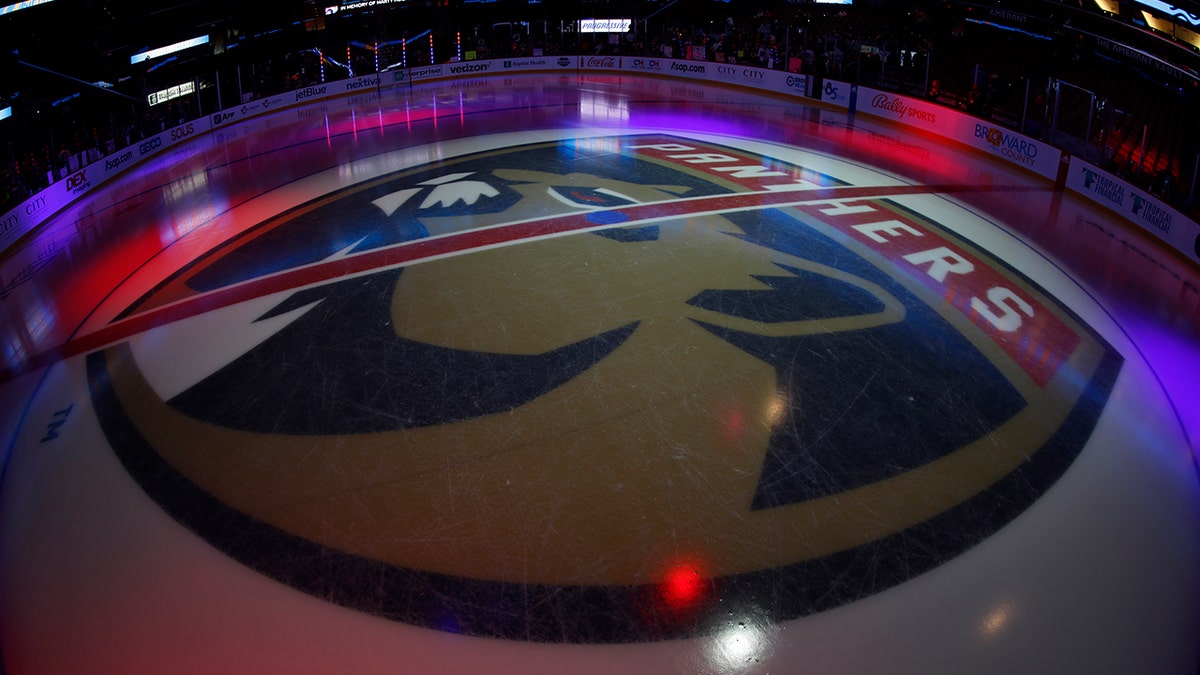 The Panthers logo on the ice