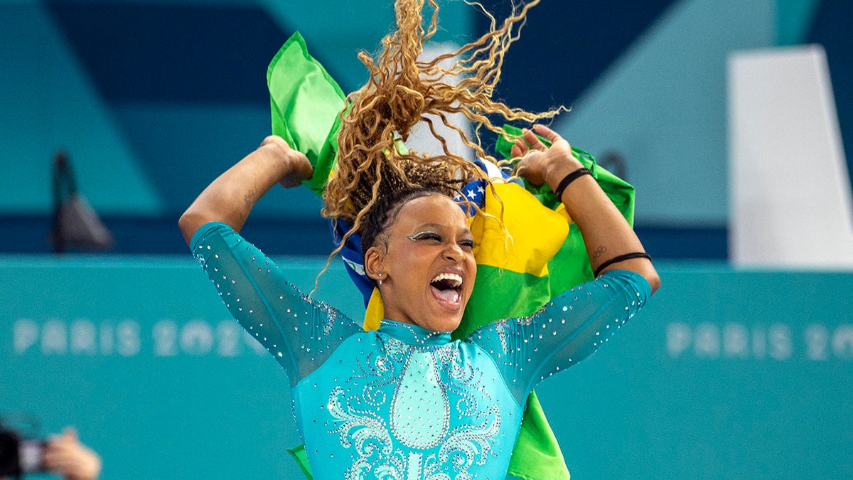 Rebeca Andrade celebrates gold