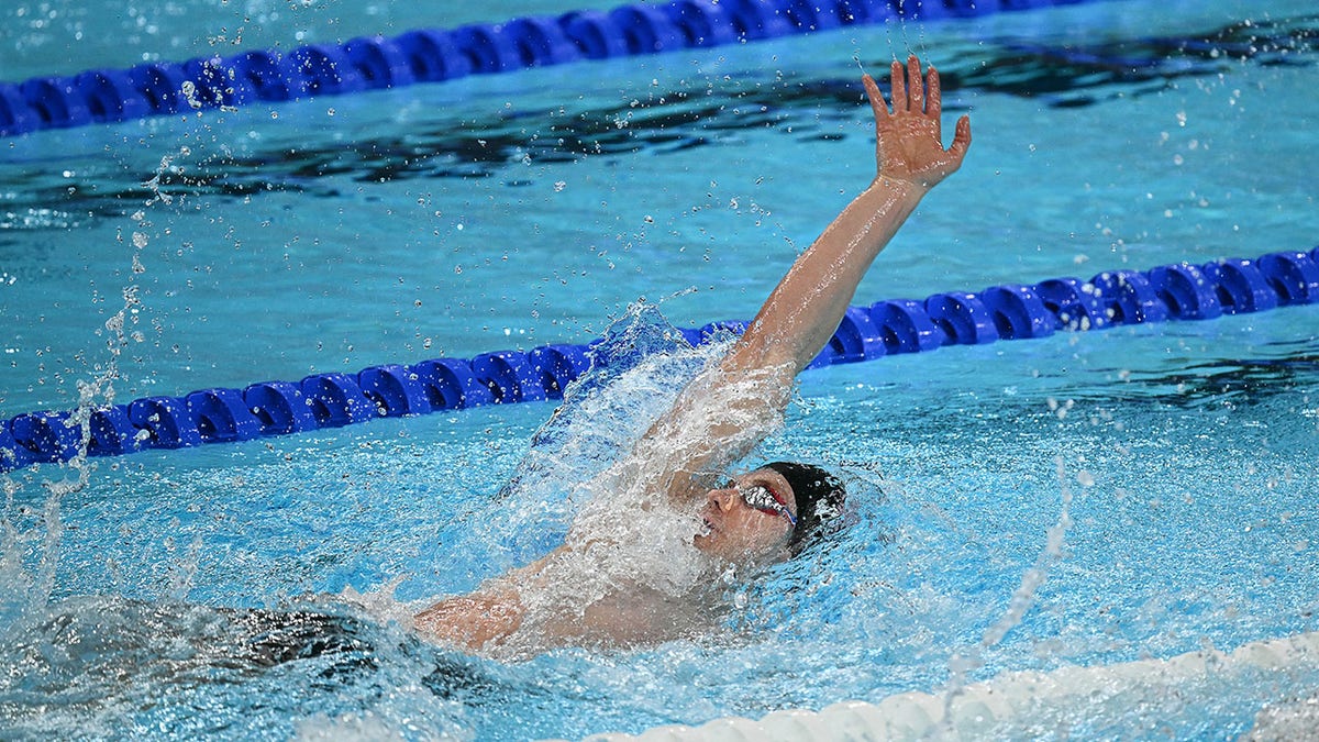 USA mixed 4x100M medley relay team breaks world record to win gold at