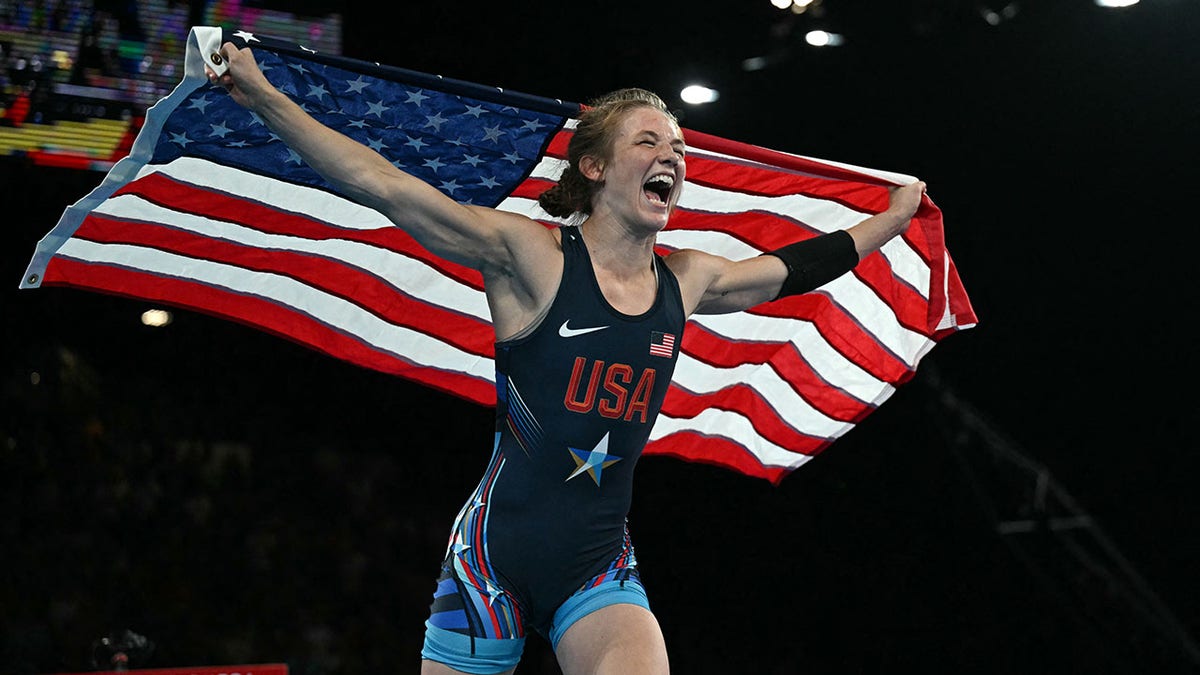 Sarah Ann Hildebrandt with American flag