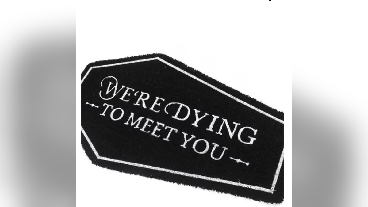 Put out this hilarious, spooky doormat for Halloween. 