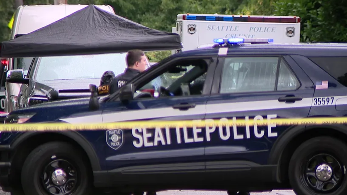 Coche de policía de Seattle en la escena del crimen