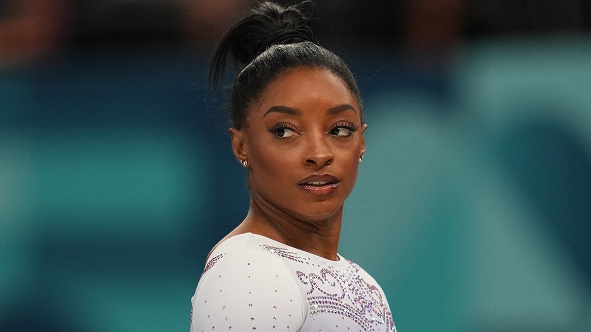 Simone Biles on the floor