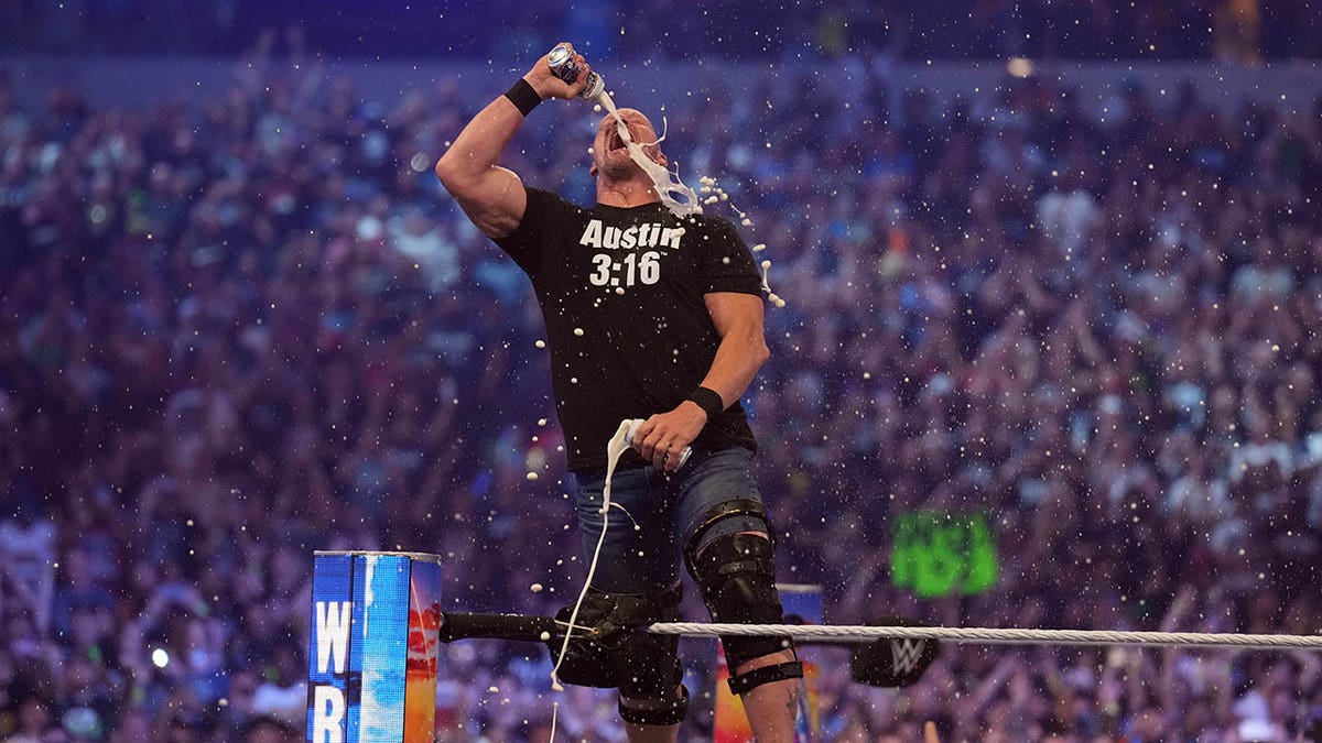 Steve Austin chugs a beer