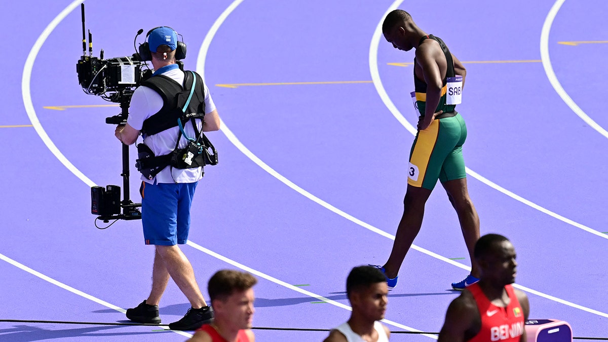 Steven Sabino walks off the track