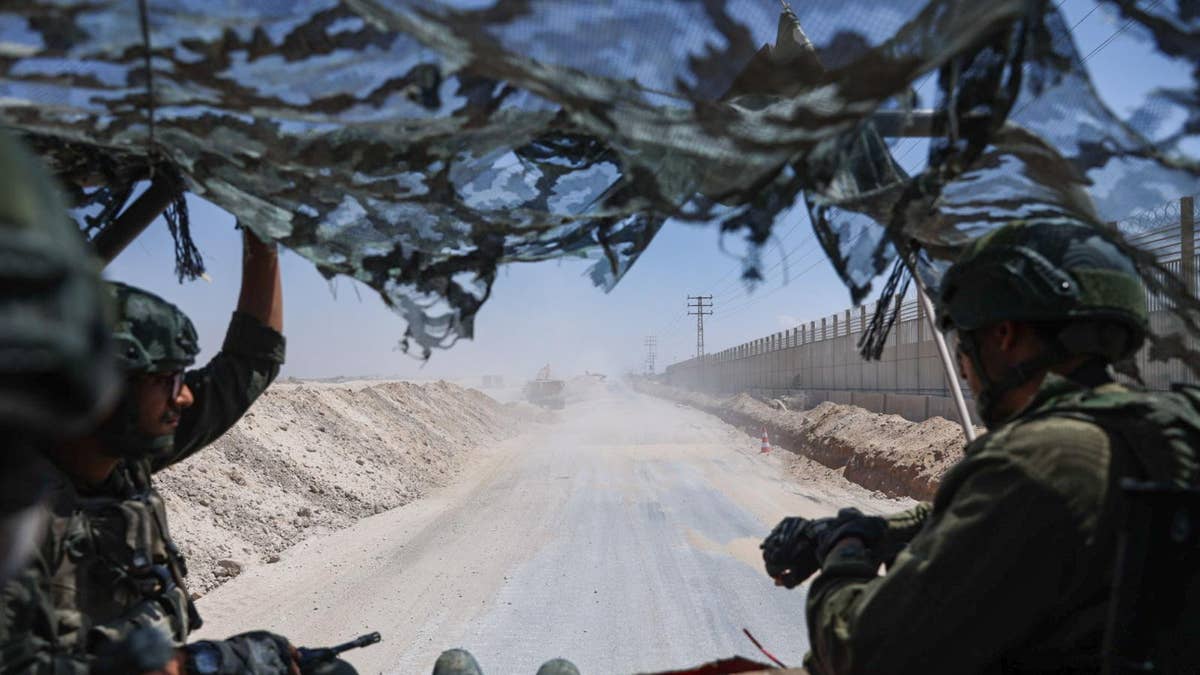 Israeli troops patrol the Philadelphi Corridor along the Gaza-Egypt border.