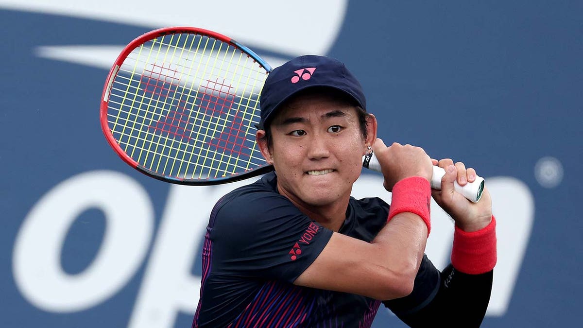 Yoshihito Nishioka plays tennis