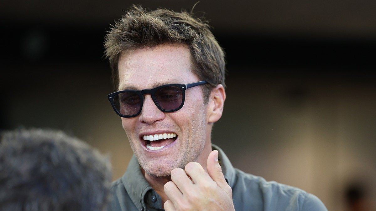 Tom Brady smiles