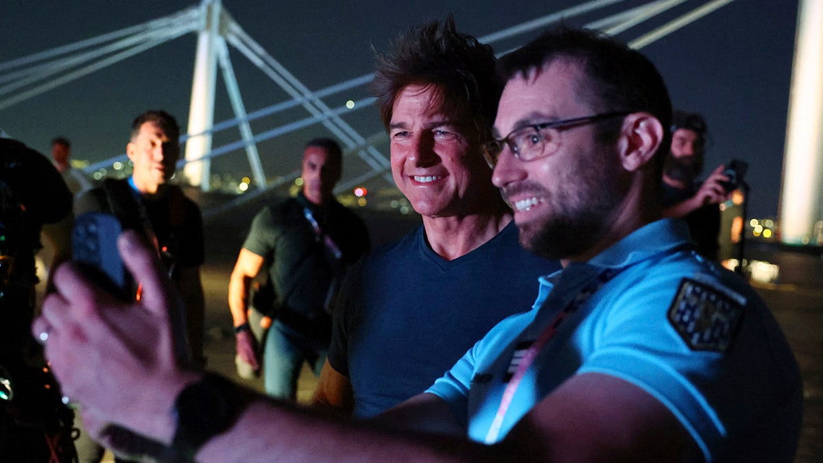 Actor Tom Cruise is shown on the roof of Stade de France during the closing ceremony of the Summer Olympics on Aug. 11, 2024, in Saint-Denis, France.