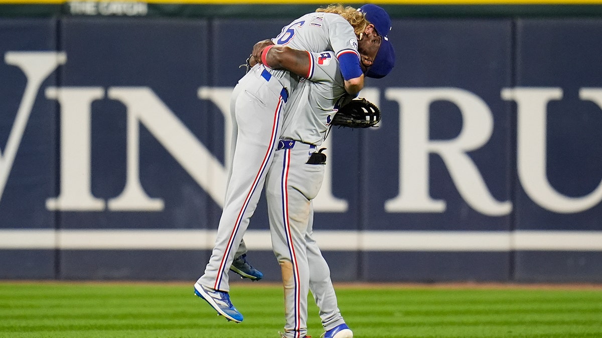 Aroldis García y Travis Jankowski