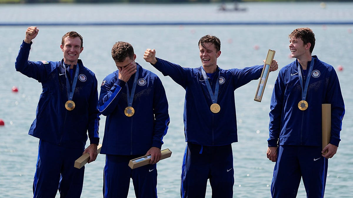 The USA Rowing Team reacts to winning gold