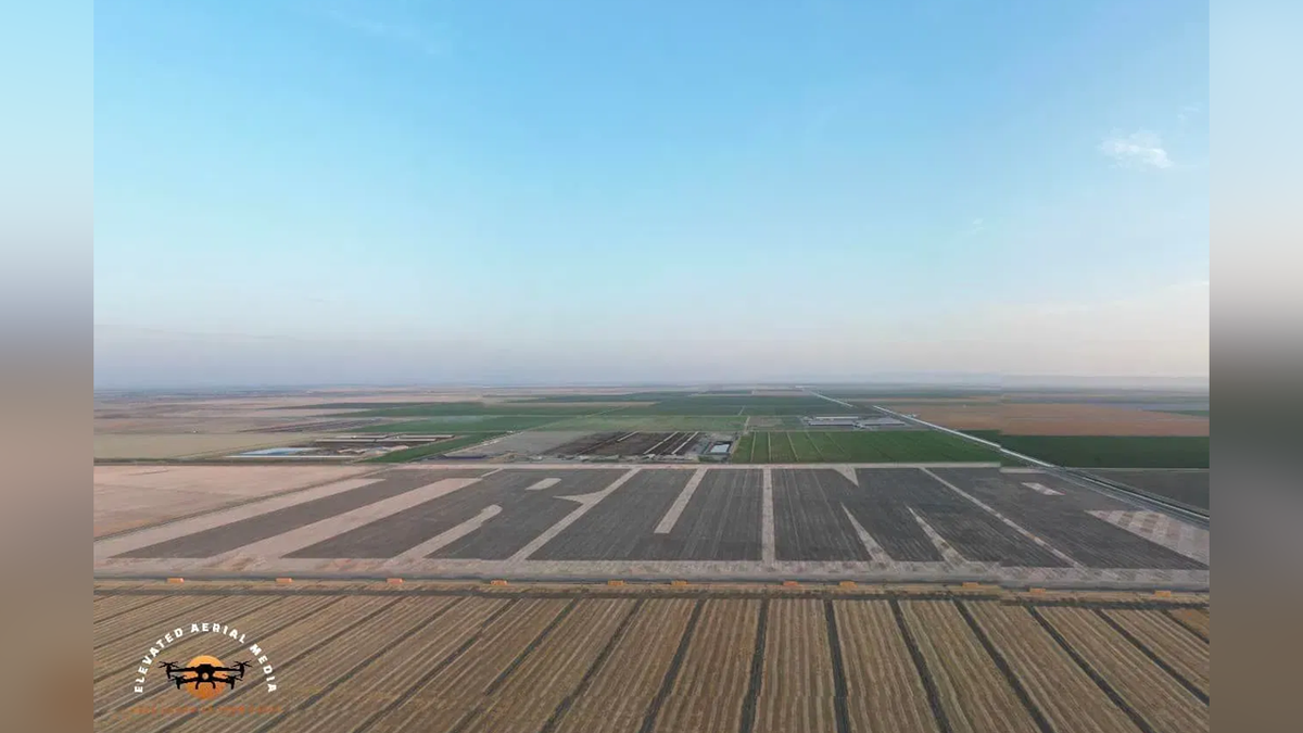 Large mural on a field in support of Donald Trump