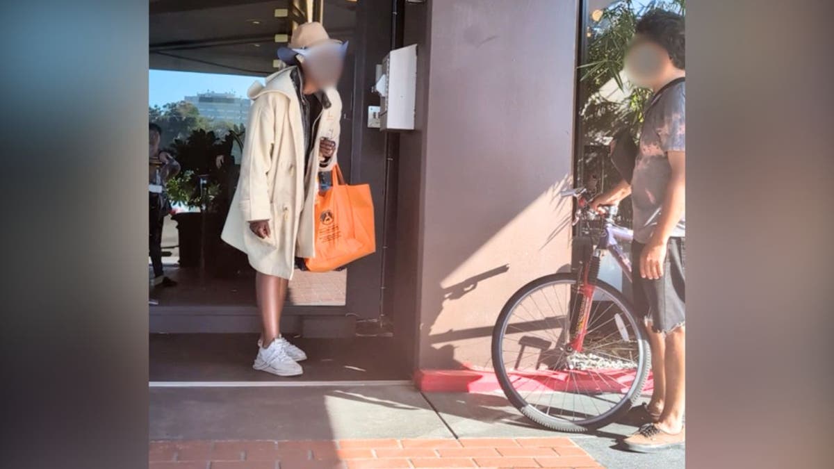 A volunteer confronts a homeless woman who allegedly stole a bag of cash