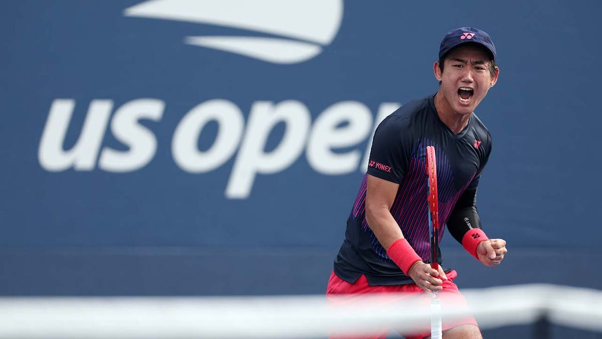 Yoshihito Nishioka celebrates