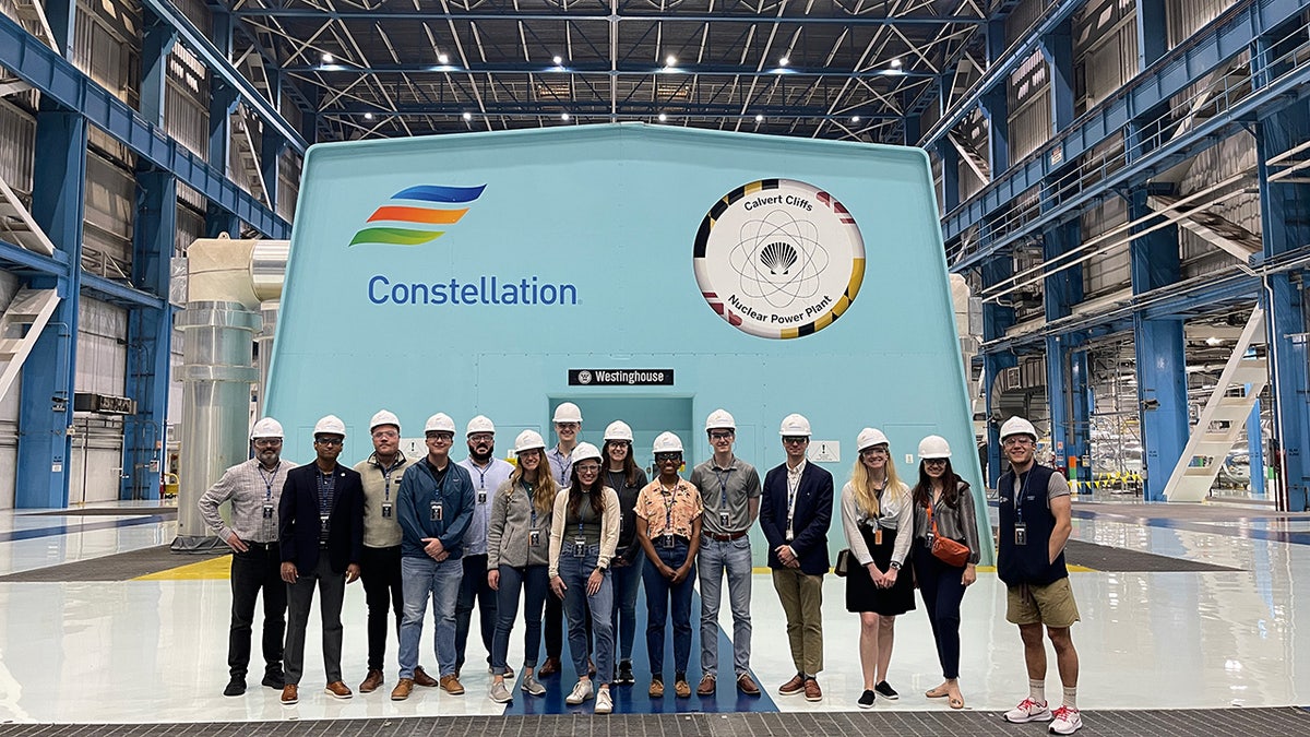 American Conservation Coalition members stand inside nuclear plant