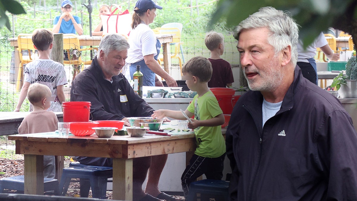 Alec Baldwin sports Adidas coat while filming TLC show with his kids.