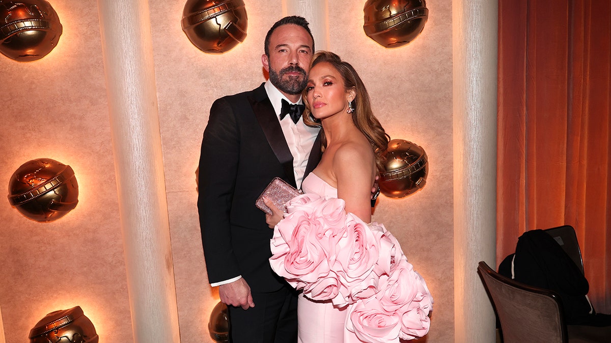 Jennifer Lopez and Ben Affleck get comfortable for a photo