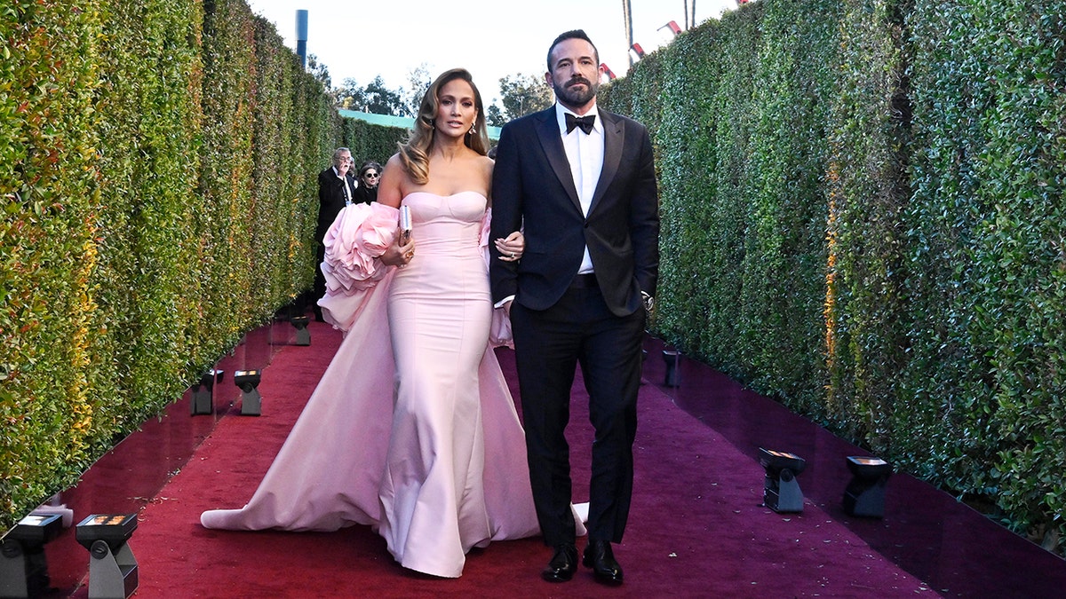 Jennifer Lopez and Ben Affleck walk hand in hand