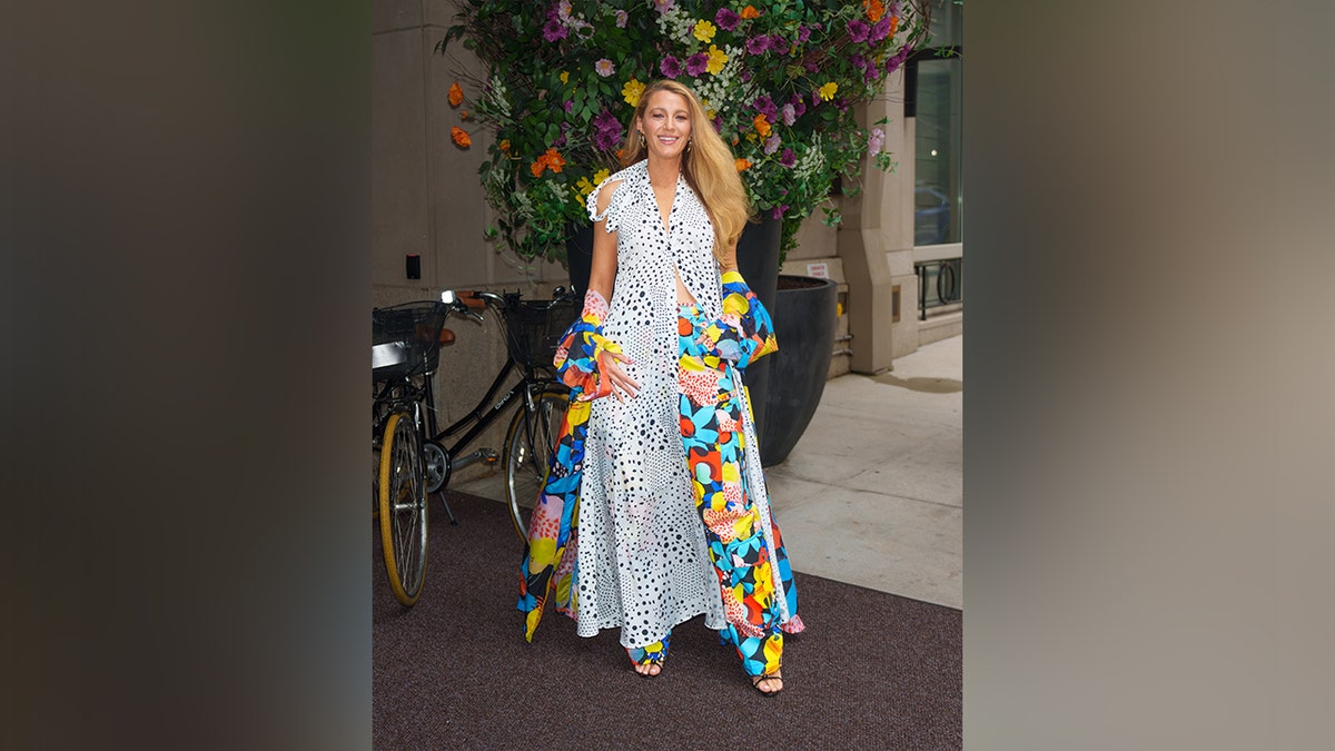 Blake Lively wore a flowing white top with colorful floral pants while out in New York.