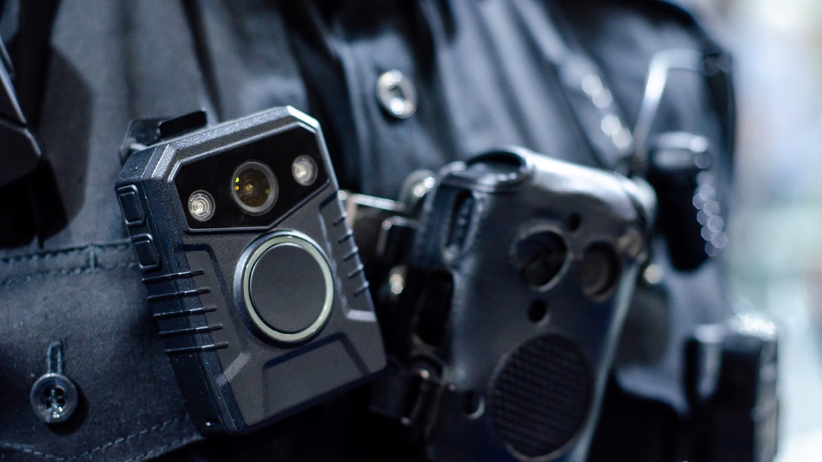 Close up body camera on police officer's chest