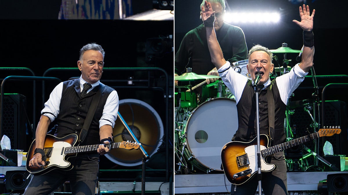 Bruce Springsteen con chaleco negro toca en el escenario con su guitarra partida Bruce Springsteen pone las dos manos en alto en el escenario