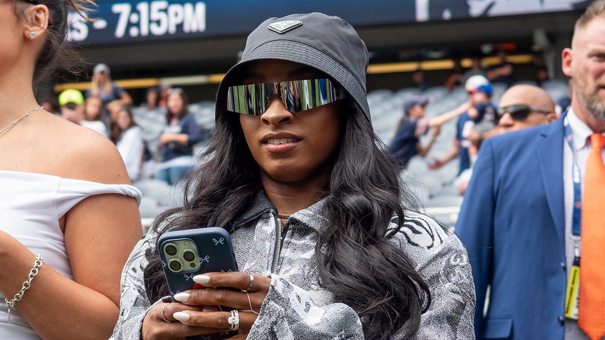 Simone Biles on the sidelines