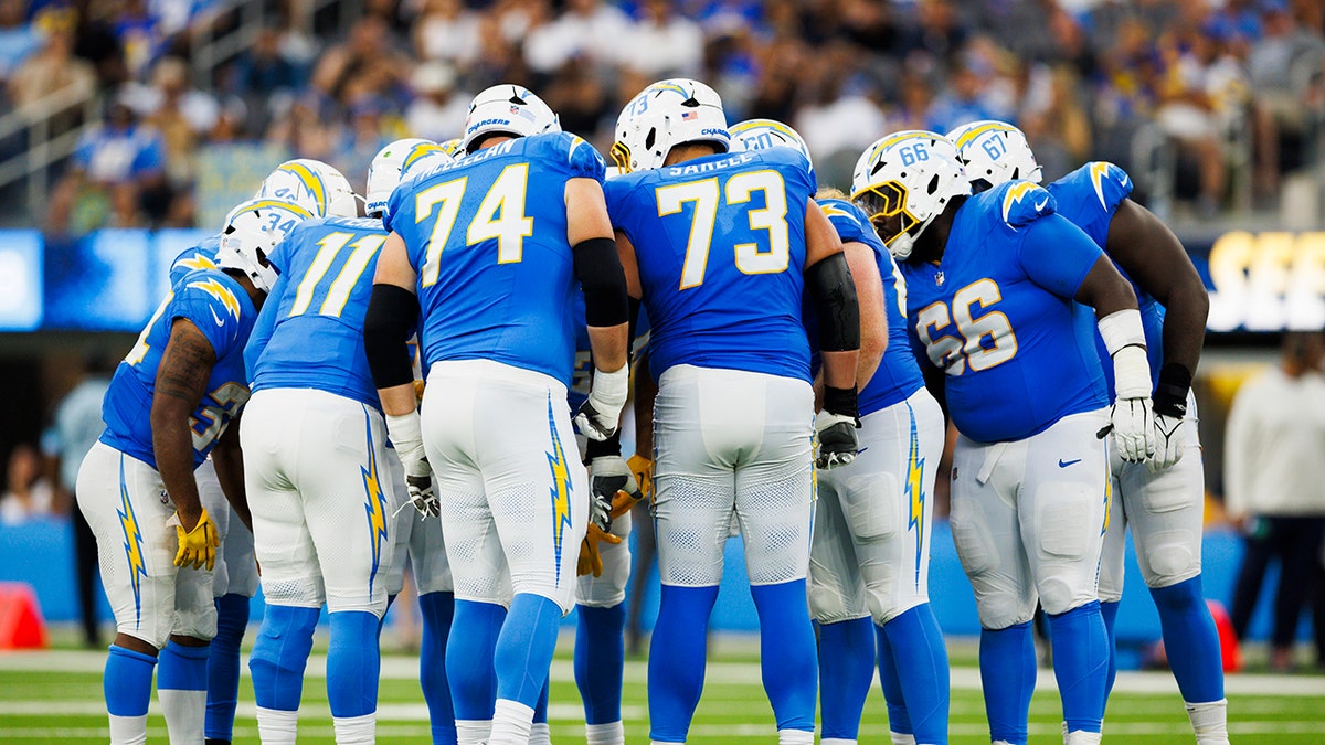 Chargers huddle