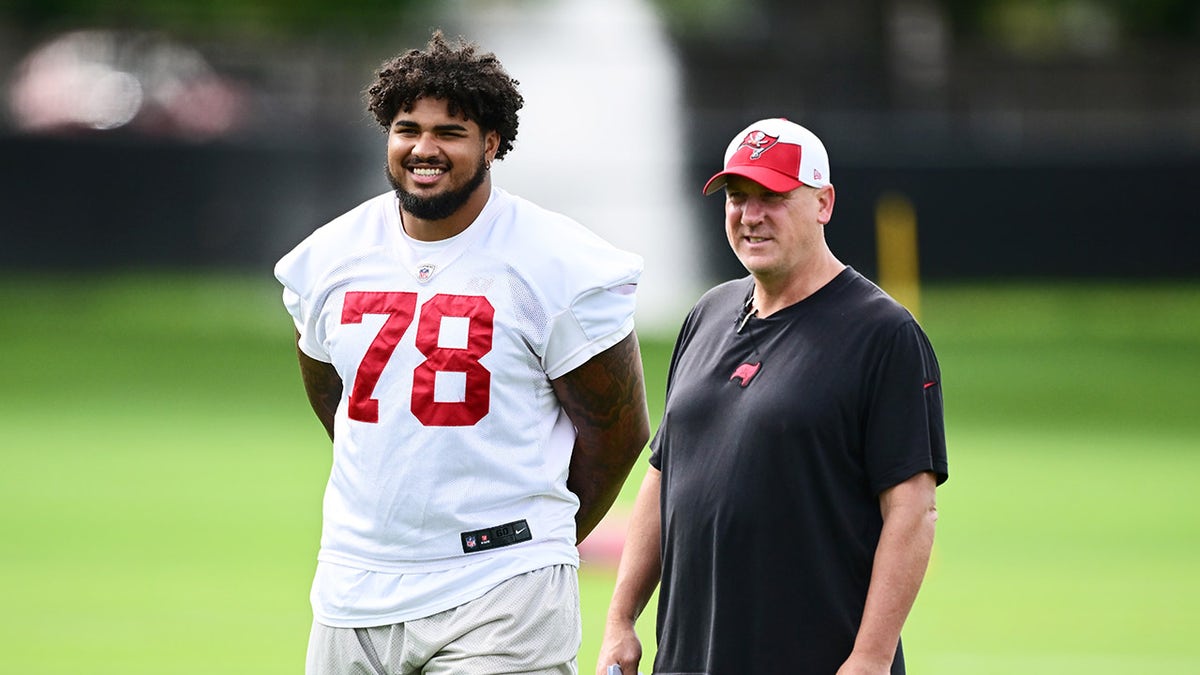 Tristin Wirfs watches the practice