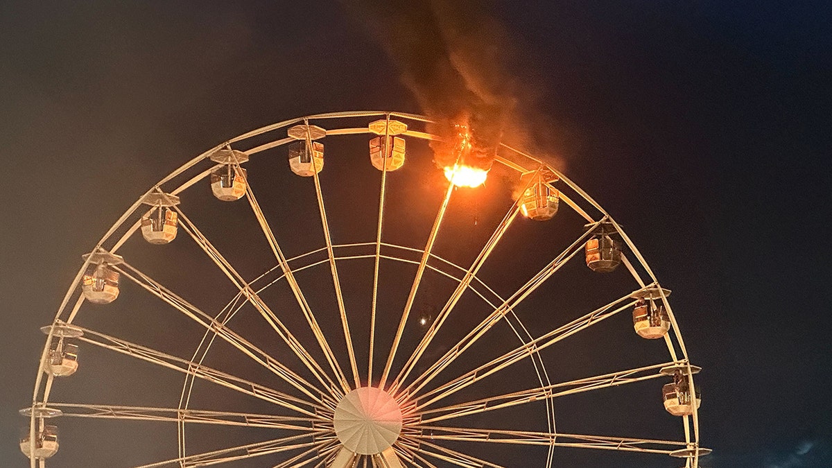 Sky-high horror stuck on video as Ferris wheel catches hearth throughout track competition