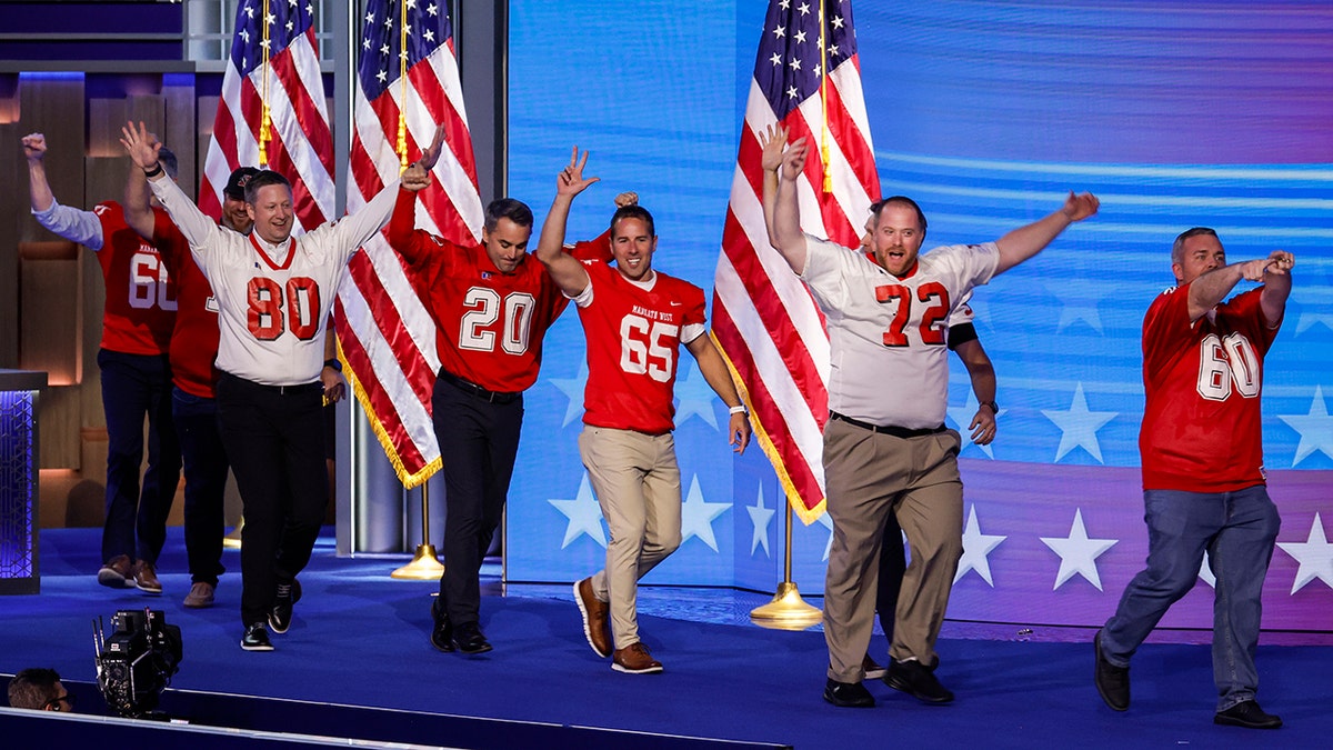 Former members of the Mankato West High School football team