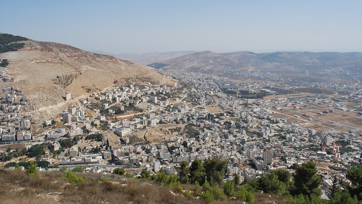 Biblical Shechem, with Mount Ebal in the background, taken from Mount Gerazim.