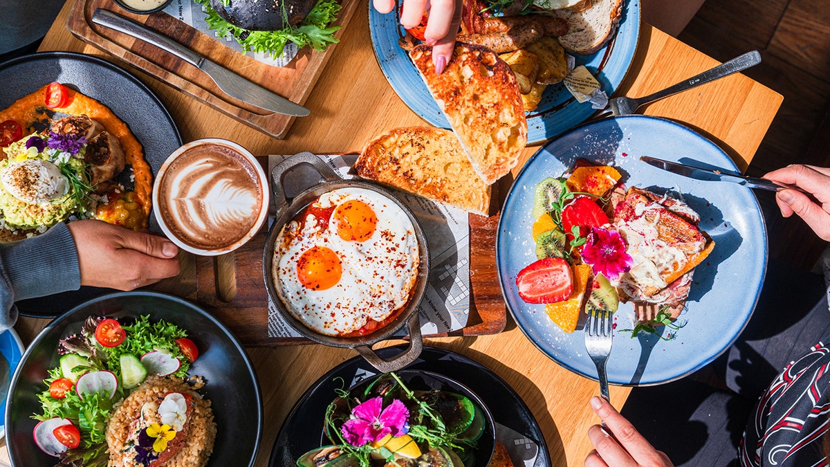 Table top view of breakfast food displayed on table