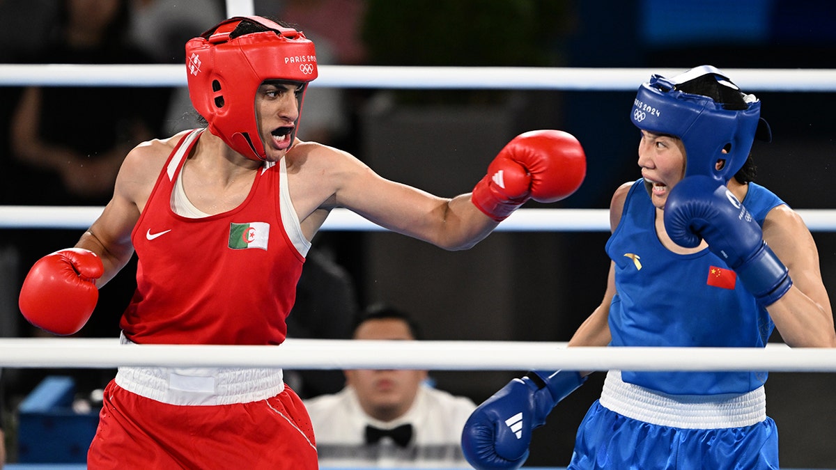 Algeria's Imane Khelif, left, battles China's Liu Yang in the women's gold medal match at the 2024 Paris Games. 