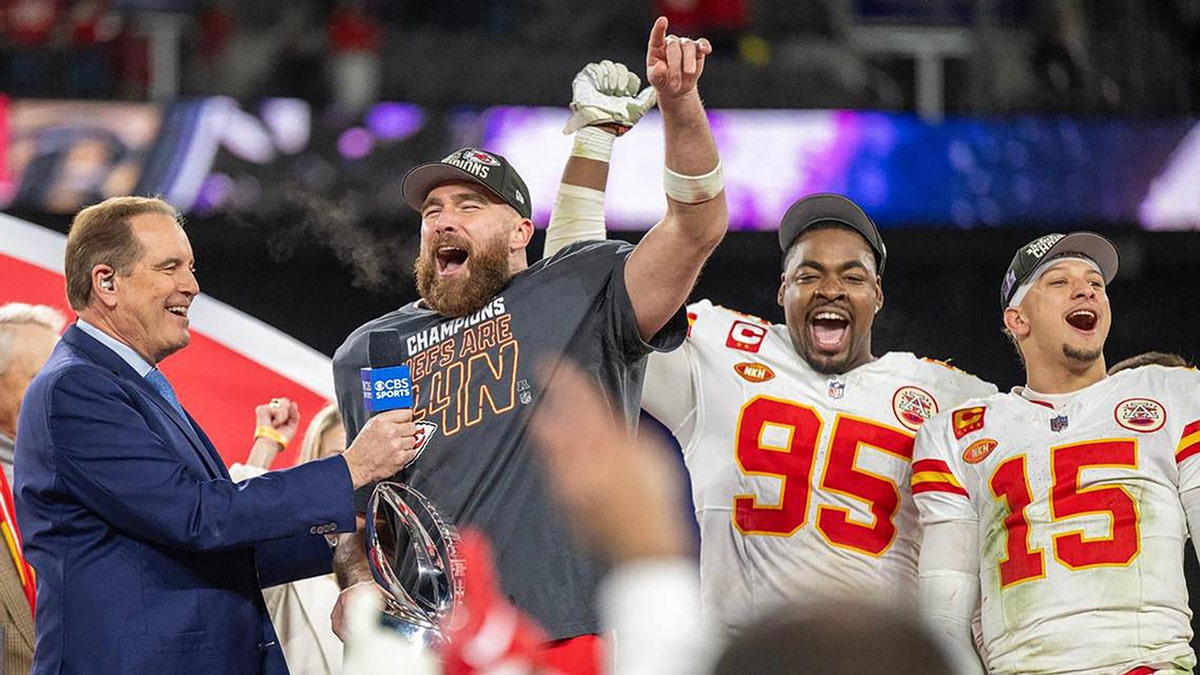Travis Kelce, Chris Jones and Patrick Mahomes celebrate after winning the AFC Championship