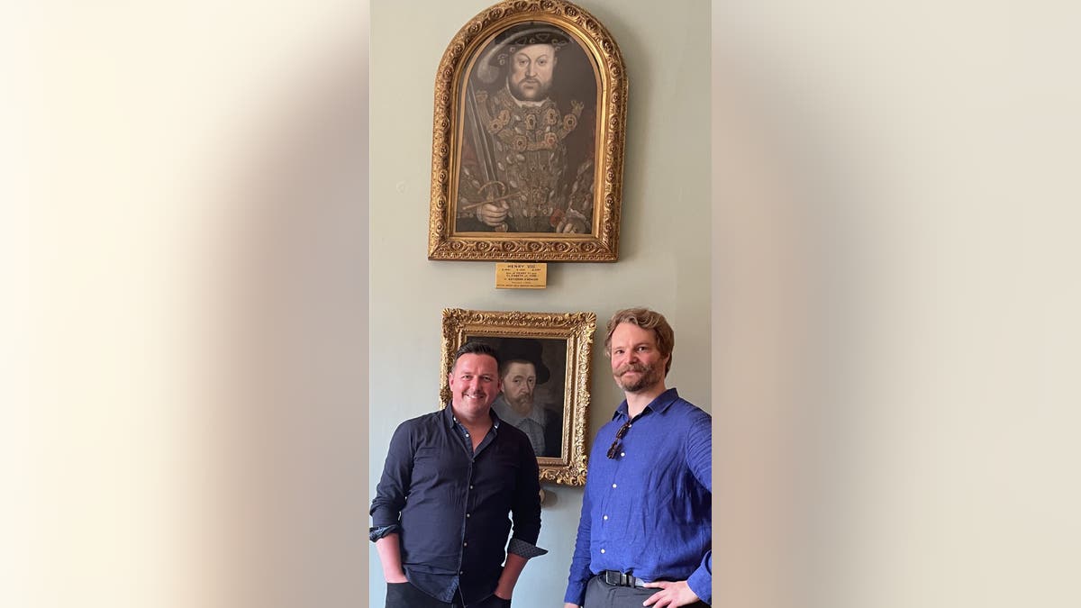 Aaron Manning and Adam Busiakiewicz with Henry VIII portrait