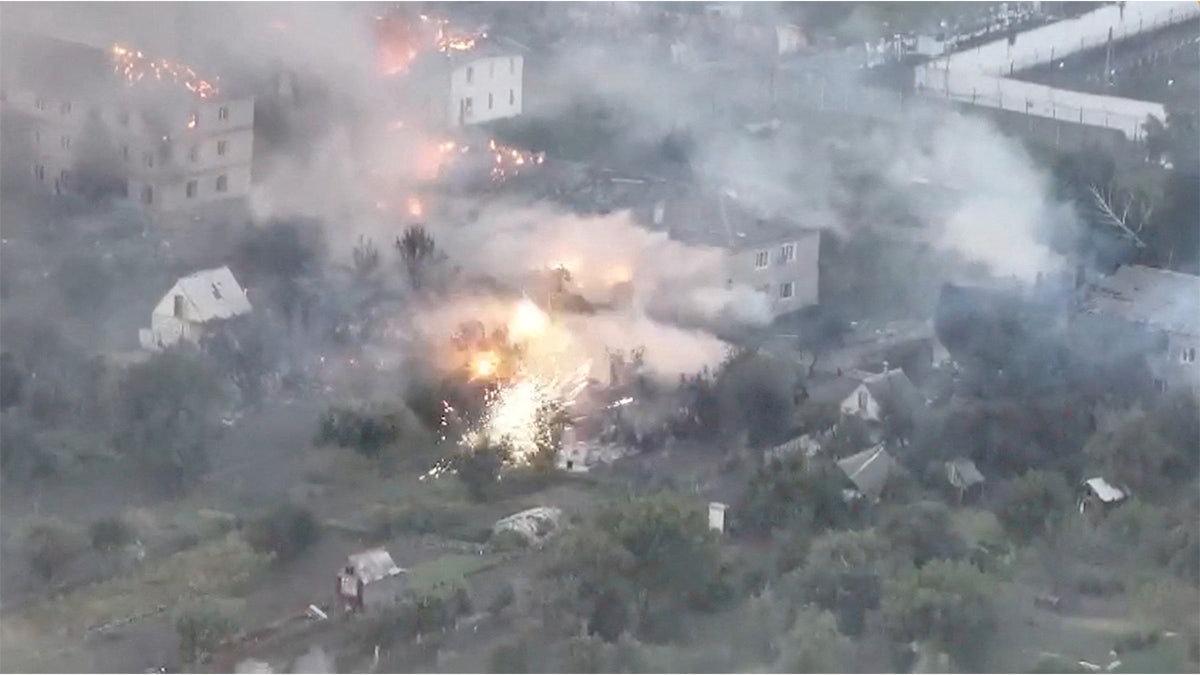 Ukrainian forces fight during military operations in the Kursk Region in Malaya Loknya, Kursk Region, Russia, in this screenshot from a handout video released on August 20, 2024.