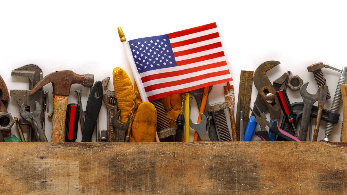 A tool belt with an American flag placed inside