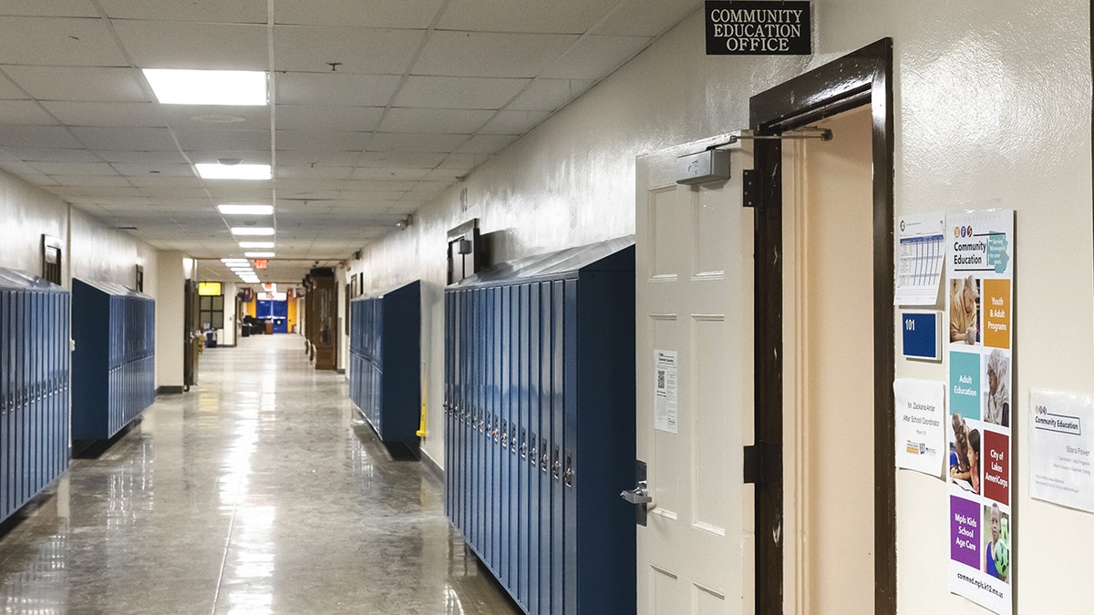 empty corridor and student lockers at a school in Minneapolis