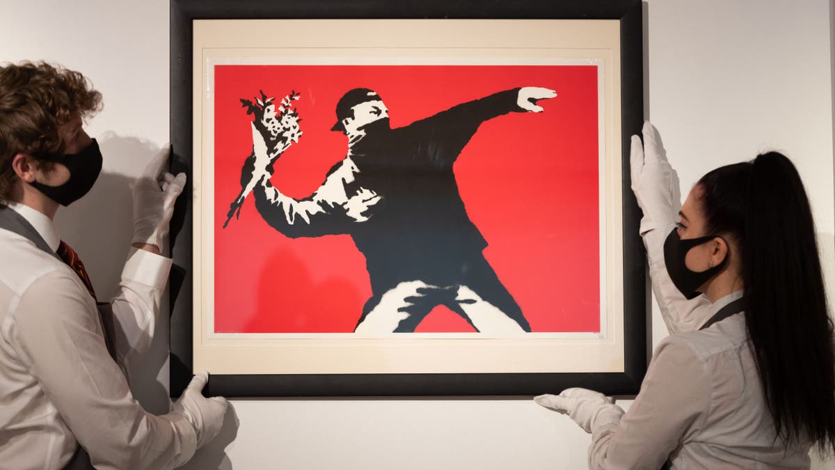 "El amor está en el aire" de Banksy