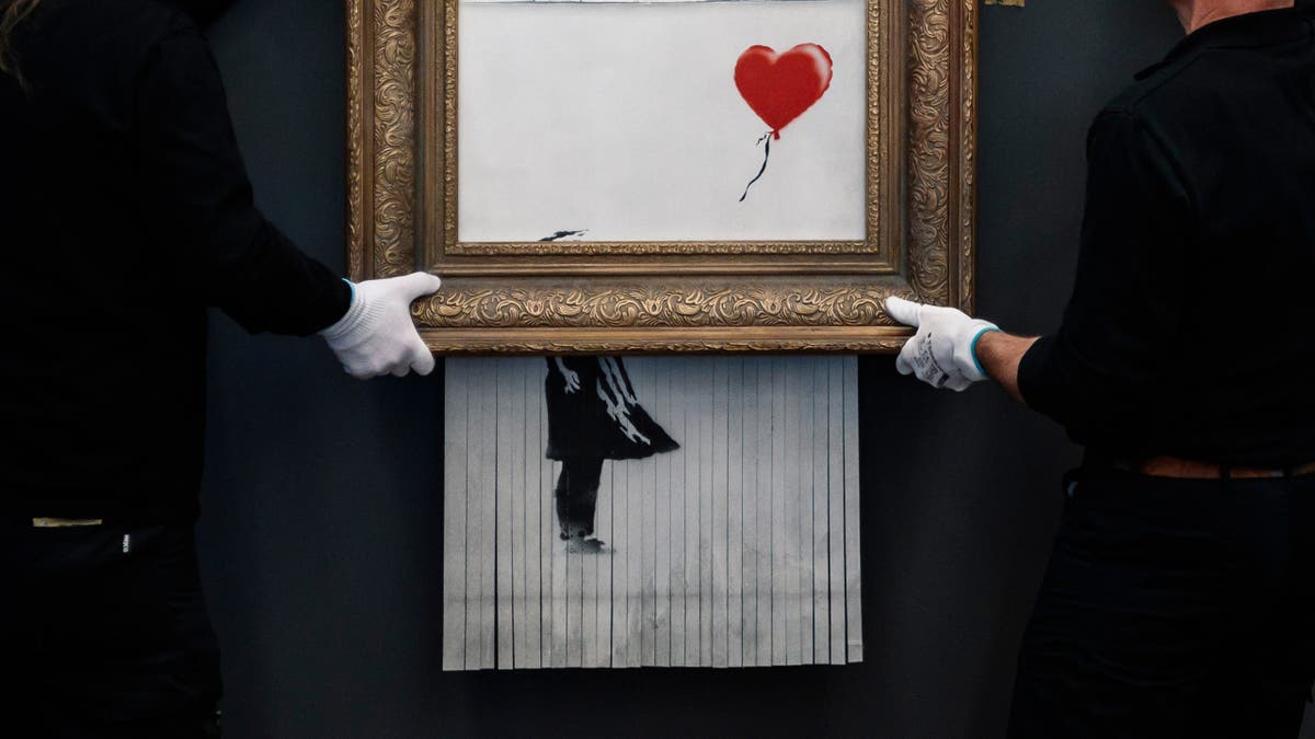 "Love In The Bin" Banksy painting