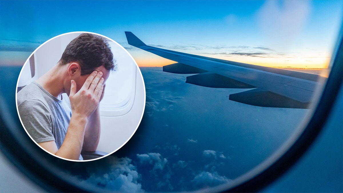 A man nervous on a flight with the view from the window seat of a plane in the background