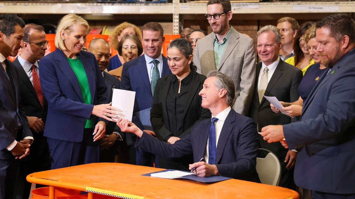 Gavin Newsom signing laws combating smash and grab