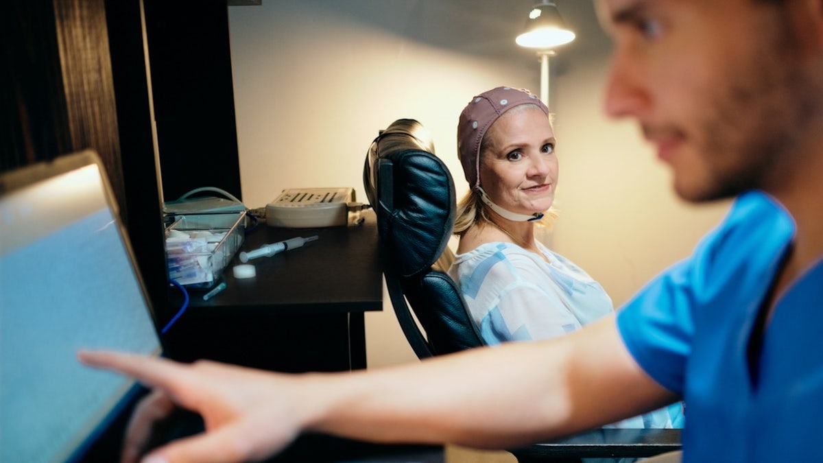 Woman getting an EEG