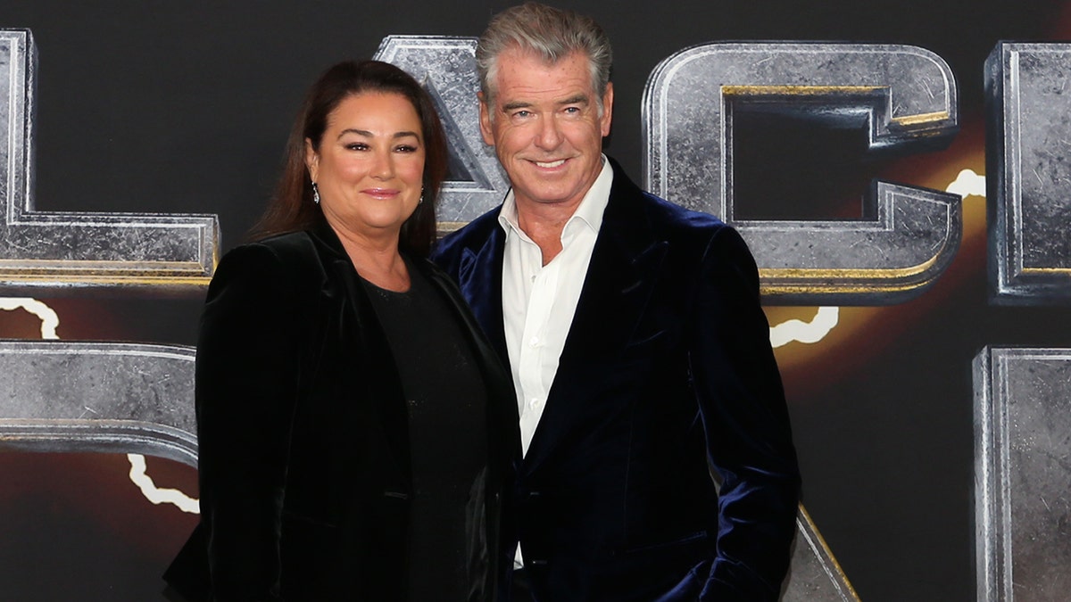Pierce Brosnan and Kelly Shaye Smith at the premiere of Black Adam.