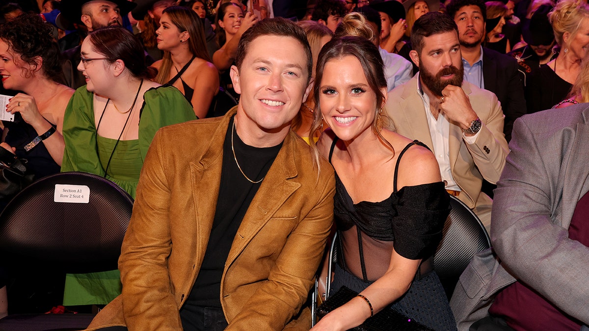 Scotty McCreery with his wife