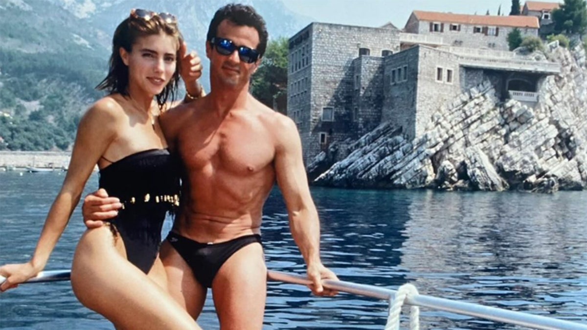 stallone in speedo, Jennifer Flavin in one piece swimsuit