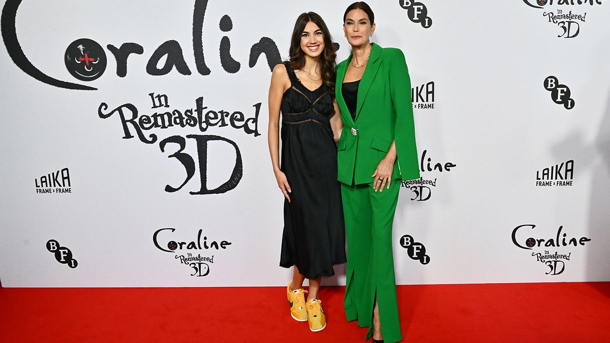 Teri Hatcher in a green suit next to her daughter Emerson Tenney.