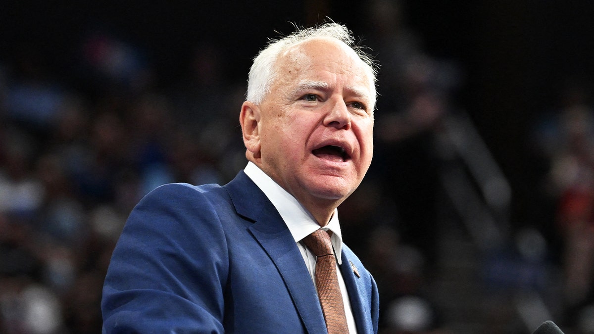 Minnesota Governor Tim Walz speaks during a campaign event at the Desert Diamond Arena in Glendale, Arizona, on August 9, 2024.