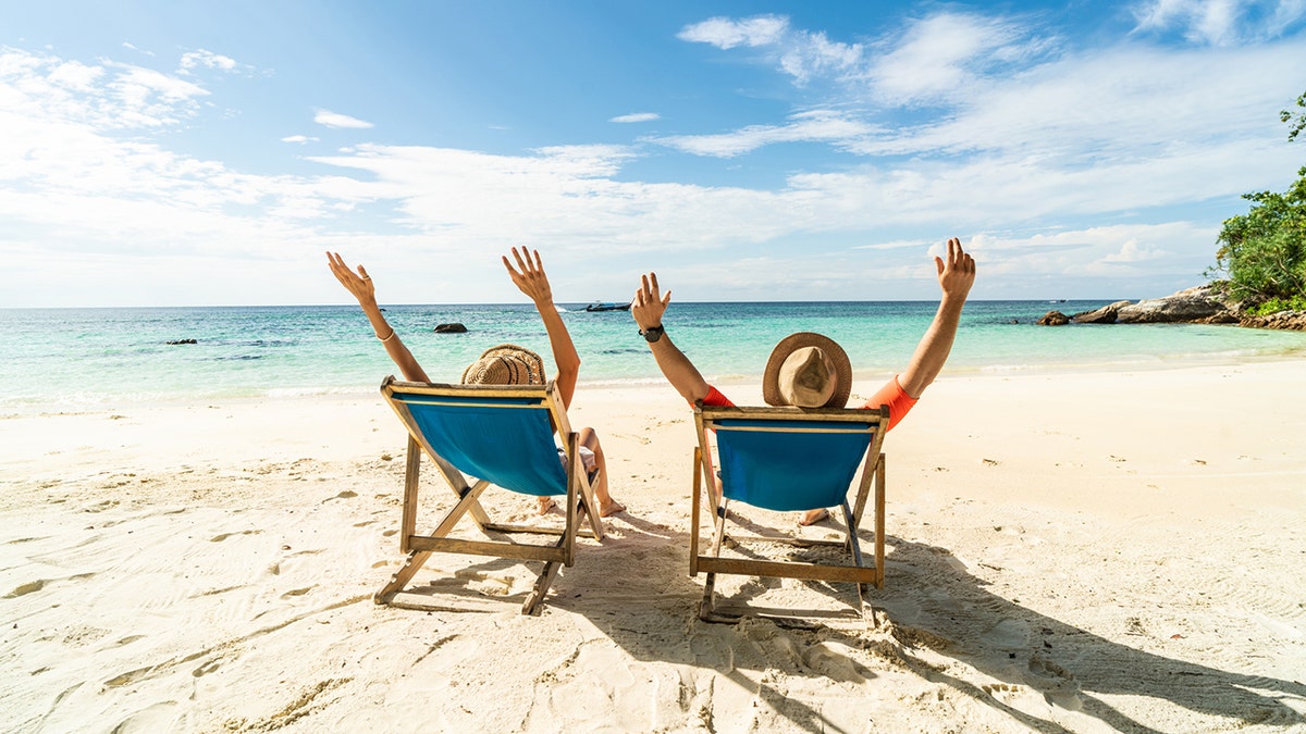 Gente de vacaciones en la playa