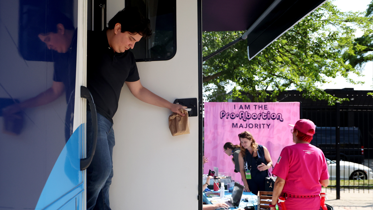 Marcus Aguinaga leaves Planned Parenthood's mobile health clinic after undergoing a vasectomy.